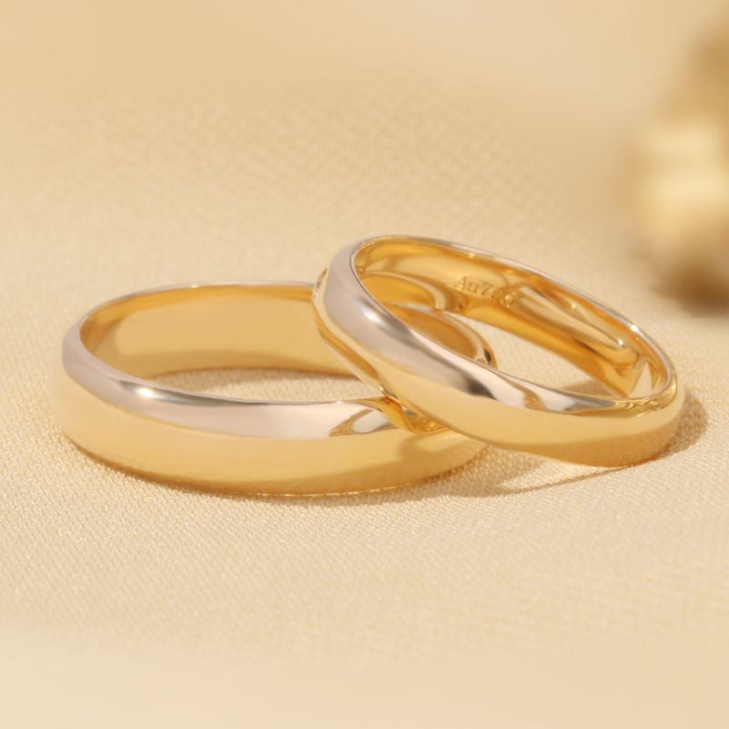 Enduring Whispers: Delicate 18Karat Gold Bands for Couples in Subtle Platinum to Rose Gold Tints